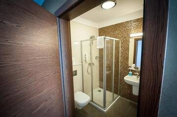 Фото номера Двухместный номер Делюкс с 1 кроватью Отель Hotel Rudnik г. Грудзёндз 6