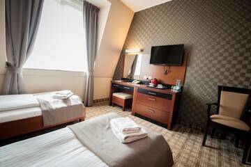Фото номера Двухместный номер с 2 отдельными кроватями Отель Hotel Rudnik г. Грудзёндз 3