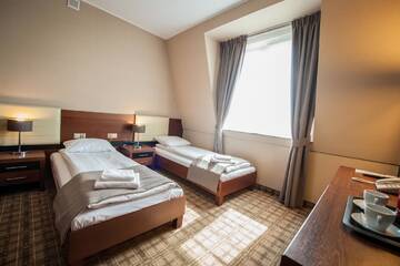 Фото номера Двухместный номер с 2 отдельными кроватями Отель Hotel Rudnik г. Грудзёндз 4