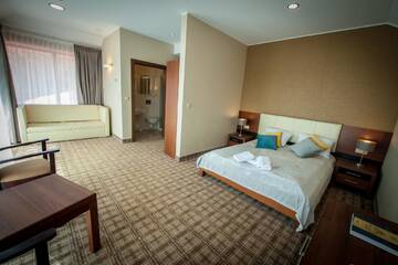 Фото номера Двухместный номер Делюкс с 1 кроватью и балконом Отель Hotel Rudnik г. Грудзёндз 3
